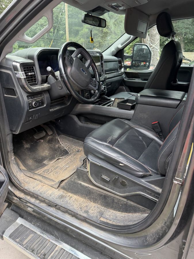 Muddy floor of a Ford Super Duty before detailing