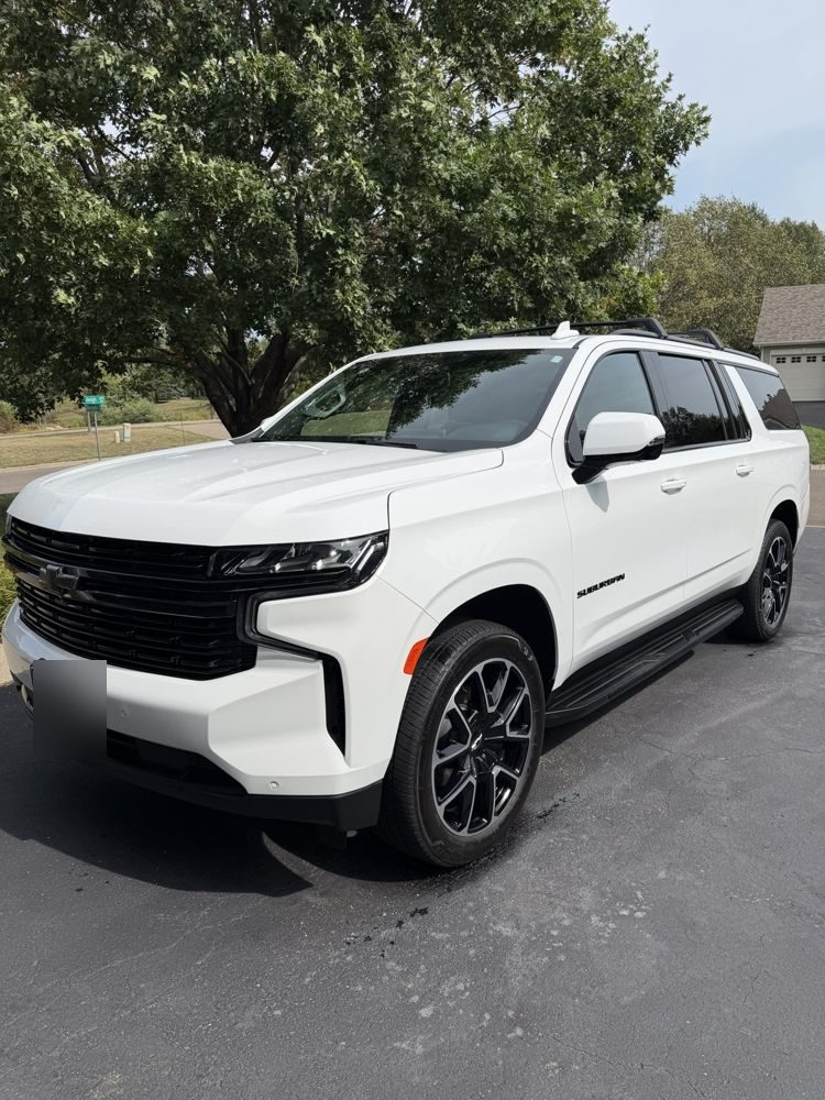 White Chevy Tahoe after a full detail